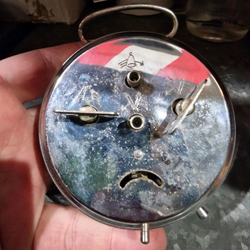 Wound analog table clock used for repair