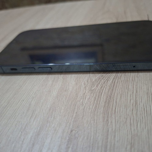 iPhone 12 Pro smartphone with 80% battery health, case included