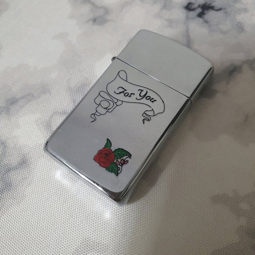 Zippo lighter used small size with engraved design