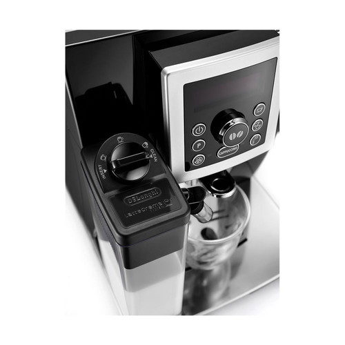 Espresso coffee maker like new with coffee beans and milk frother