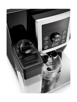 Espresso coffee maker like new with coffee beans and milk frother