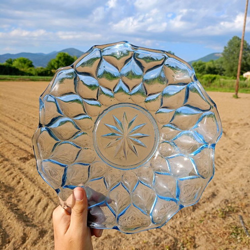 Glass carved fruit bowl used with blue color