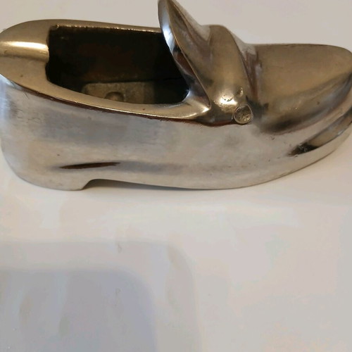 Metal ashtray in shoe shape like new