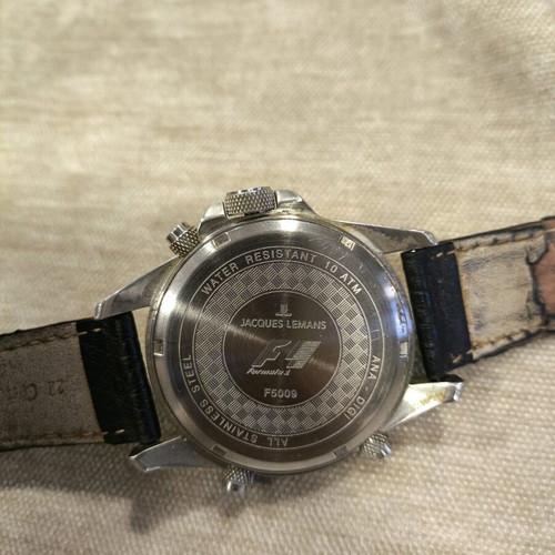 Jacques Lemans F5009 watch used with worn glass and strap