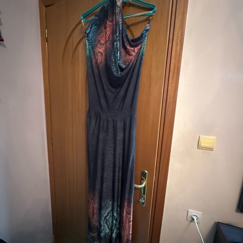 Evening dress used with chain jewelry on the back