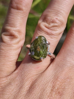 Silver ring with natural peridot new, size US 9.5
