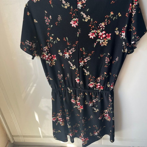 Set of two playsuits rompers like new, black floral and striped Bershka