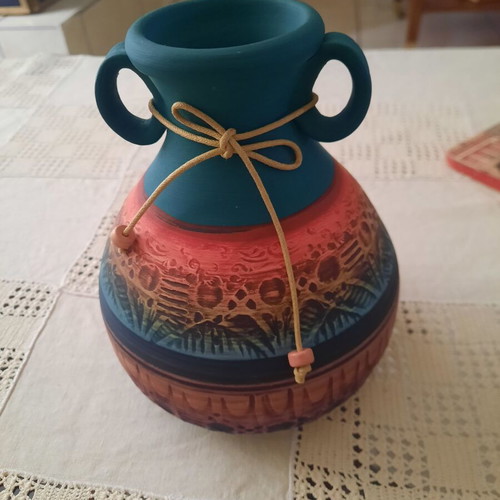 Clay vase handmade with vivid colors