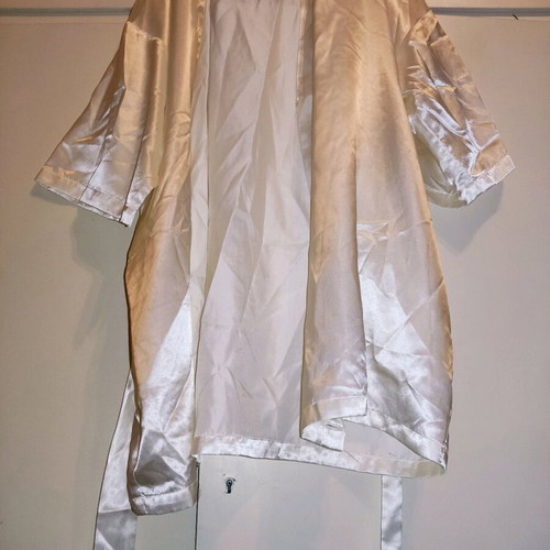 2 women's robes like new, one cream and one black with flower detail