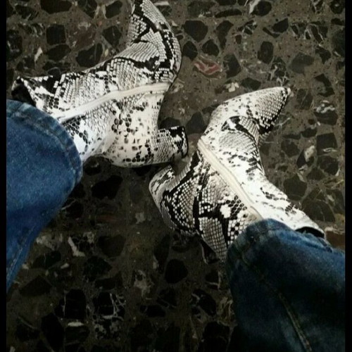 Boots spring snake skin design black and white like new