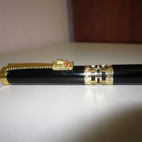 Pen new black ink with gold dragon design