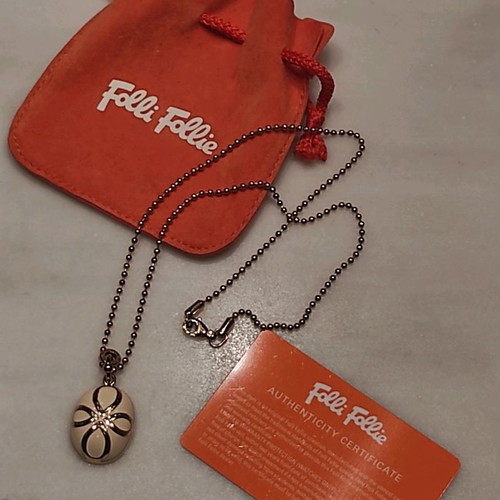 Folli Follie necklace used pink gold plated oval cross with floral design