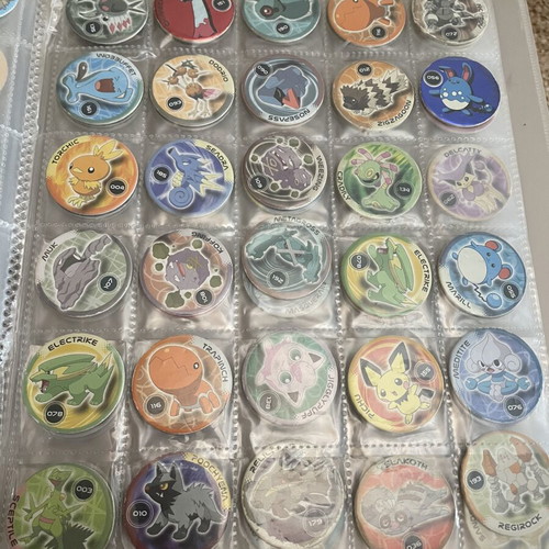 Pokemon tazos with album collection