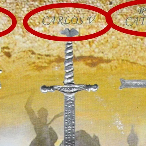 Collectible frame with 18 silver miniature swords and daggers