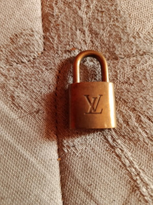 Louis Vuitton authentic padlock without key