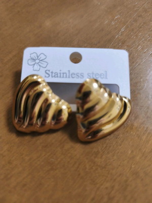 Heart-shaped clip-on earrings new, gold color with embossed design