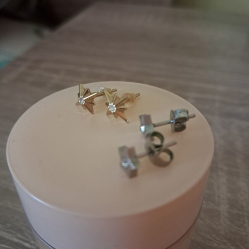 Steel earrings used, gold and silver set