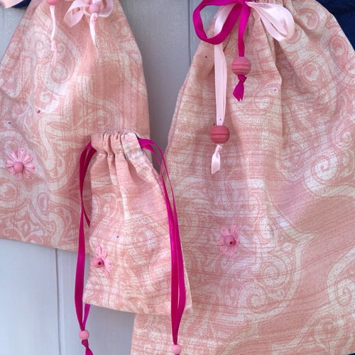 Set of three handmade pink pouches new, cotton with wooden beads