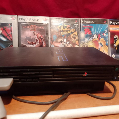 PlayStation 2 (PS2) used with 5 games pack and controller