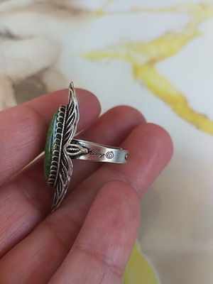 Women's ring new with green stone