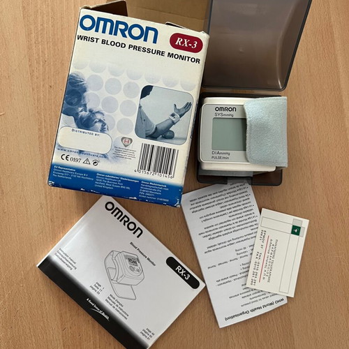 Omron digital wrist blood pressure monitor used