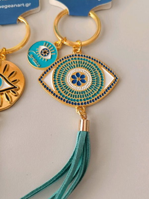 Aegeanart keychain new, gold with green tassel and evil eye