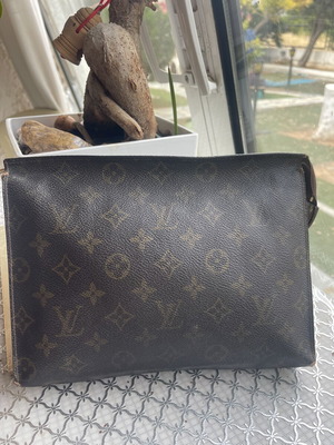 Louis Vuitton Pochette τσάντα χειρός σε καφέ