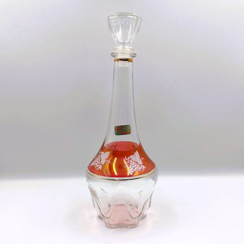 Italian glass decanter with glasses used, red with gold details