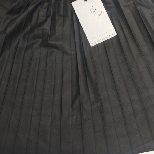Leather skirt new, black, sizes 10 to 16 years