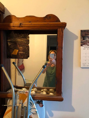 Cupboard with shelves and mirror