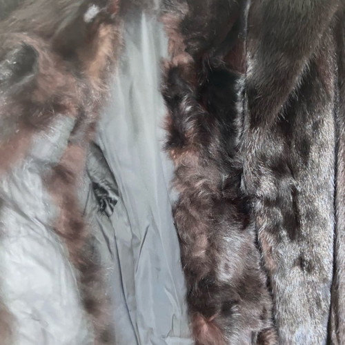 Fur genuine one-piece new, black, with pockets