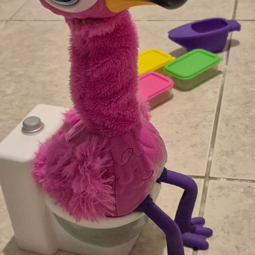 Flamingo Gotta Go interactive toy used, pink plush with electronic head