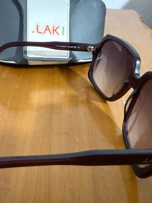 LAK women's sunglasses used, purple, with minor scratches