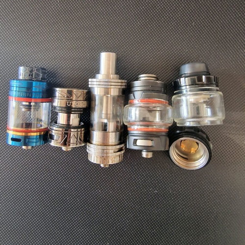 Vape bundle used with 5 atomizers including Uwell Crown and Smok