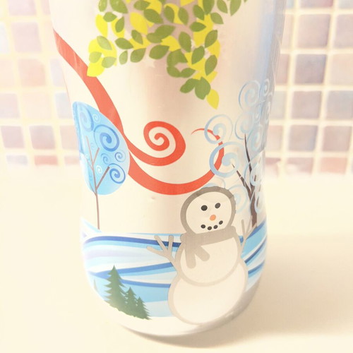 Aura Christmas collectible bottle 1 liter like new, empty