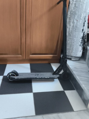 Scooter used, non-electric with replaced rear wheel