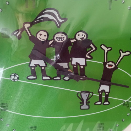 Wall clock with football theme, quartz mechanism, glass/plastic surface