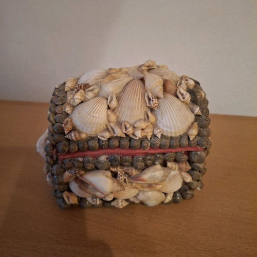Vintage jewelry box made of shells used with minor damage