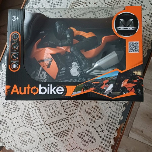 Toy motorcycle vehicle with rider, sounds, lights, and bump & go function new