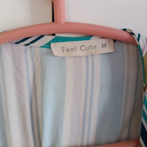 Feel Cute Cropped Wrap Striped Blouse size M like new, multicolor