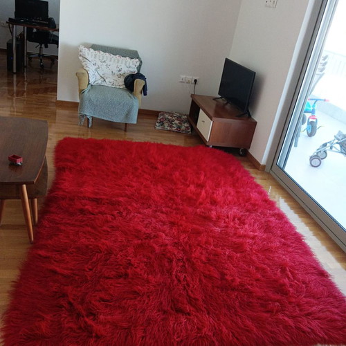 Red flokati rug dimensions 2.50 x 1.73