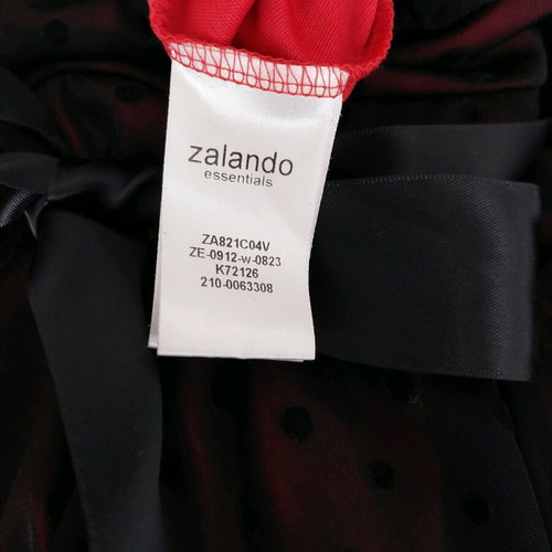 Women's evening dress new, black with red lining and satin belt