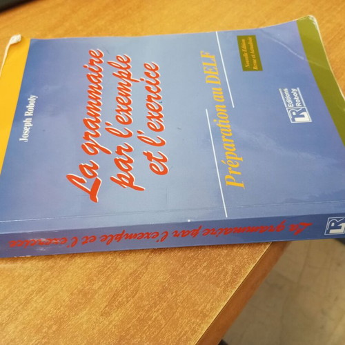 La grammaire par l'exemple et l'exercice Preparation au DELF by Joseph Roboly