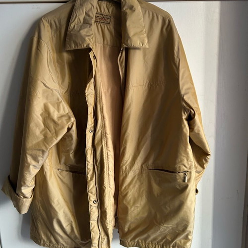Women's gold jacket branded like new, size XL