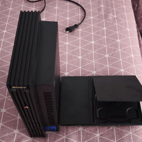 PlayStation 2 (PS2) used with 10 games and memory card