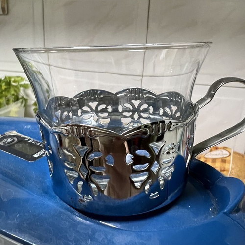 Coffee set with metal holders like new, includes tray and sugar bowl