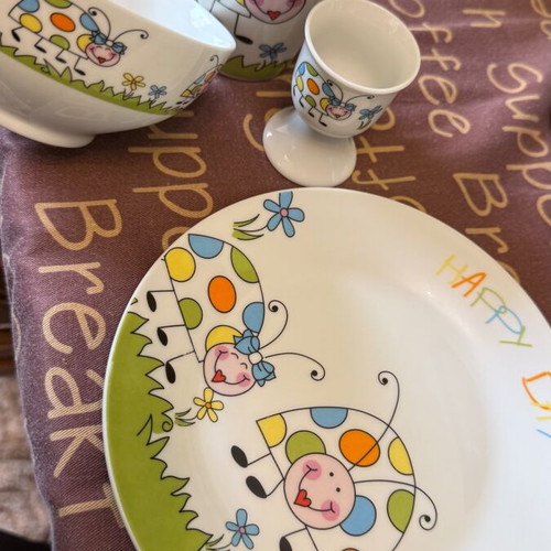 Porcelain kids dining set new with plate, glass, egg cup, fork and spoon