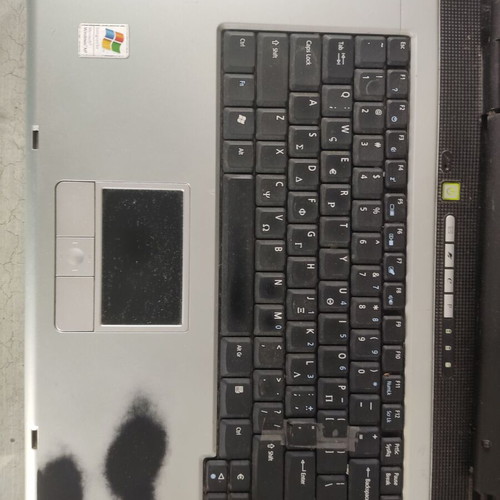 Acer Aspire 5024 laptop used with power adapter and Windows XP