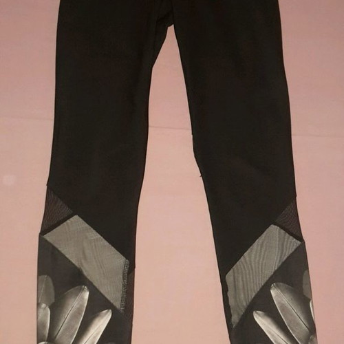 Black women's leggings new with beautiful detail at bottom, X small