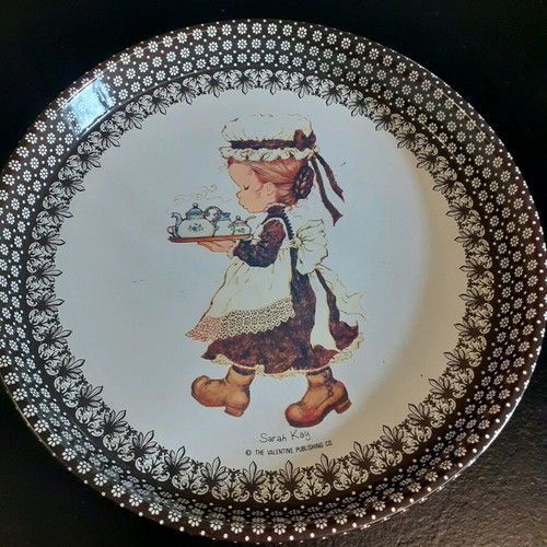 Sarah Kay decorative metal tray and porcelain plate used, set of 2 pieces